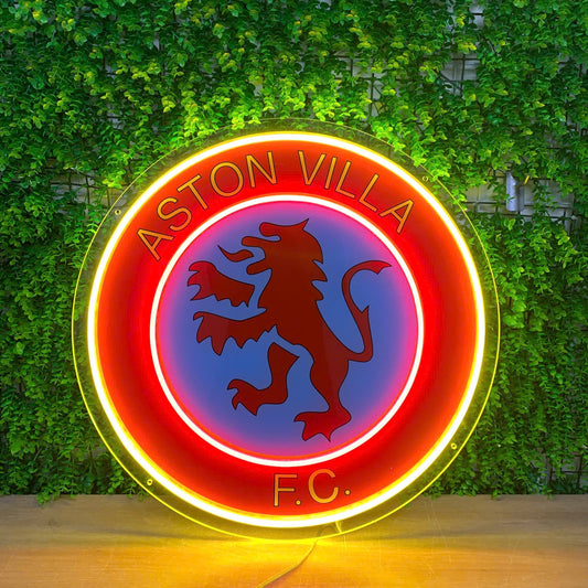 A circular illuminated neon-style sign featuring the Aston Villa F.C.
